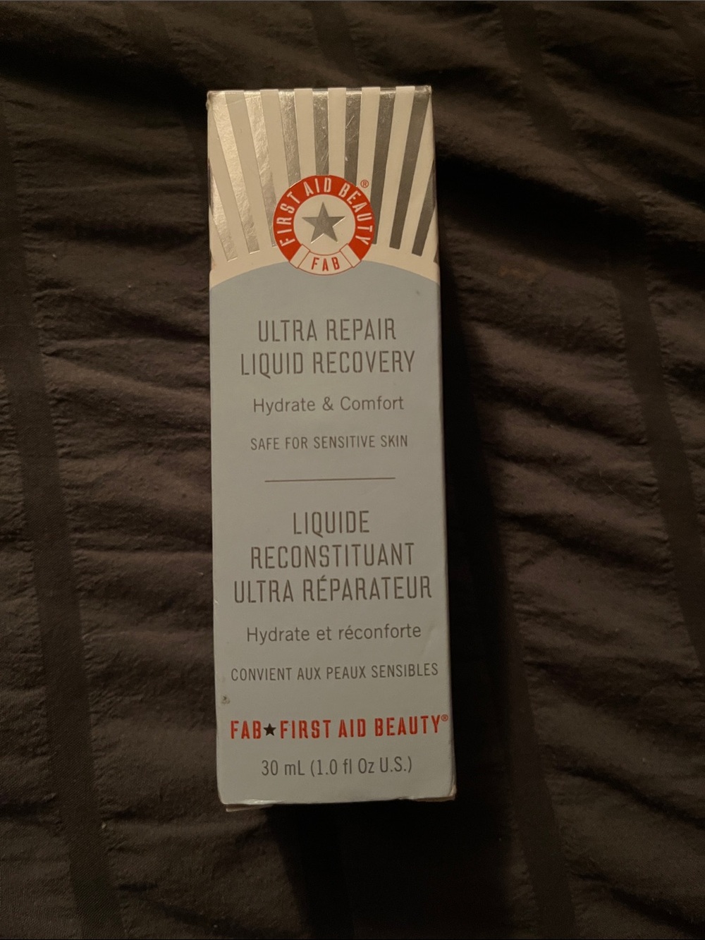 First Aid Beauty Ultra Repair Liquid Recovery - Light Blue and White Packaging